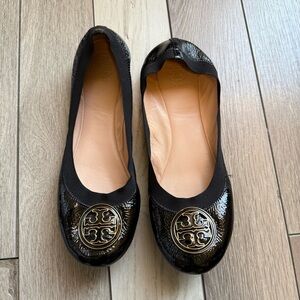 Tory Burch Black and Gold Loafers with Signature Medallion